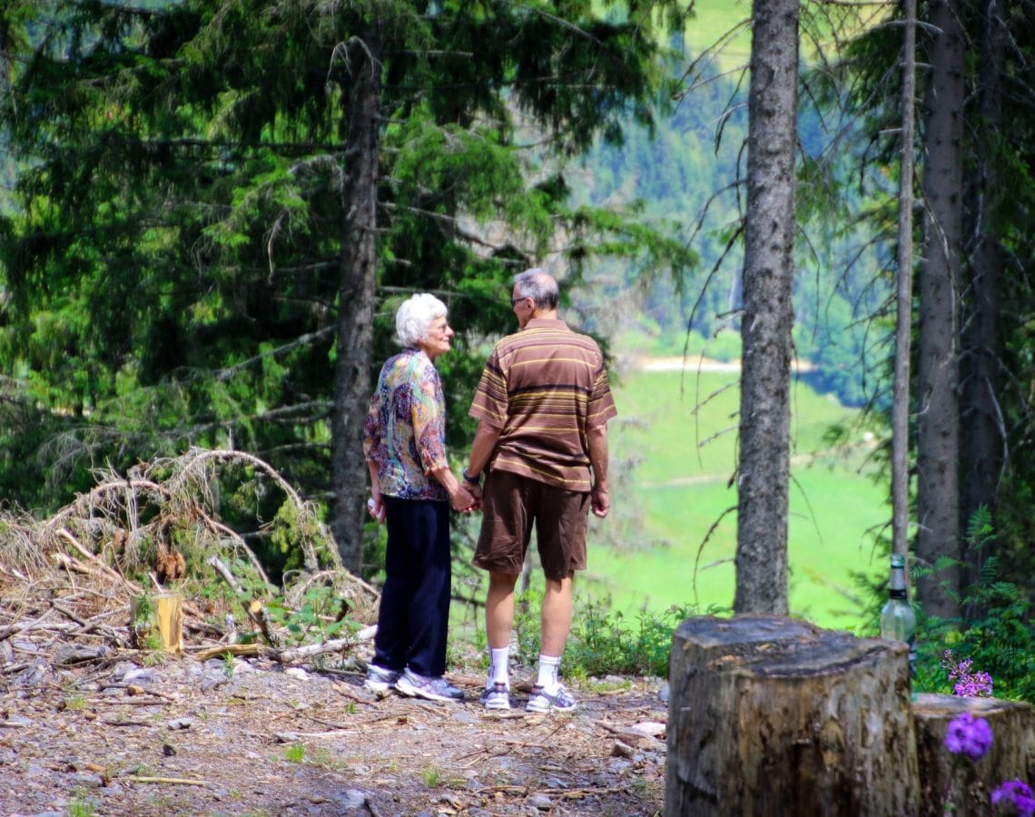 two-people-standing-in-forest-1307391