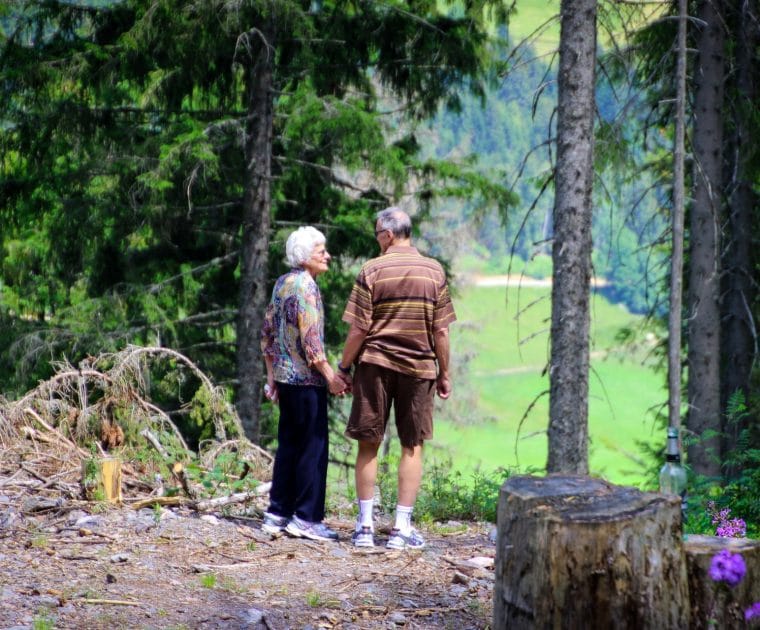 two-people-standing-in-forest-1307391