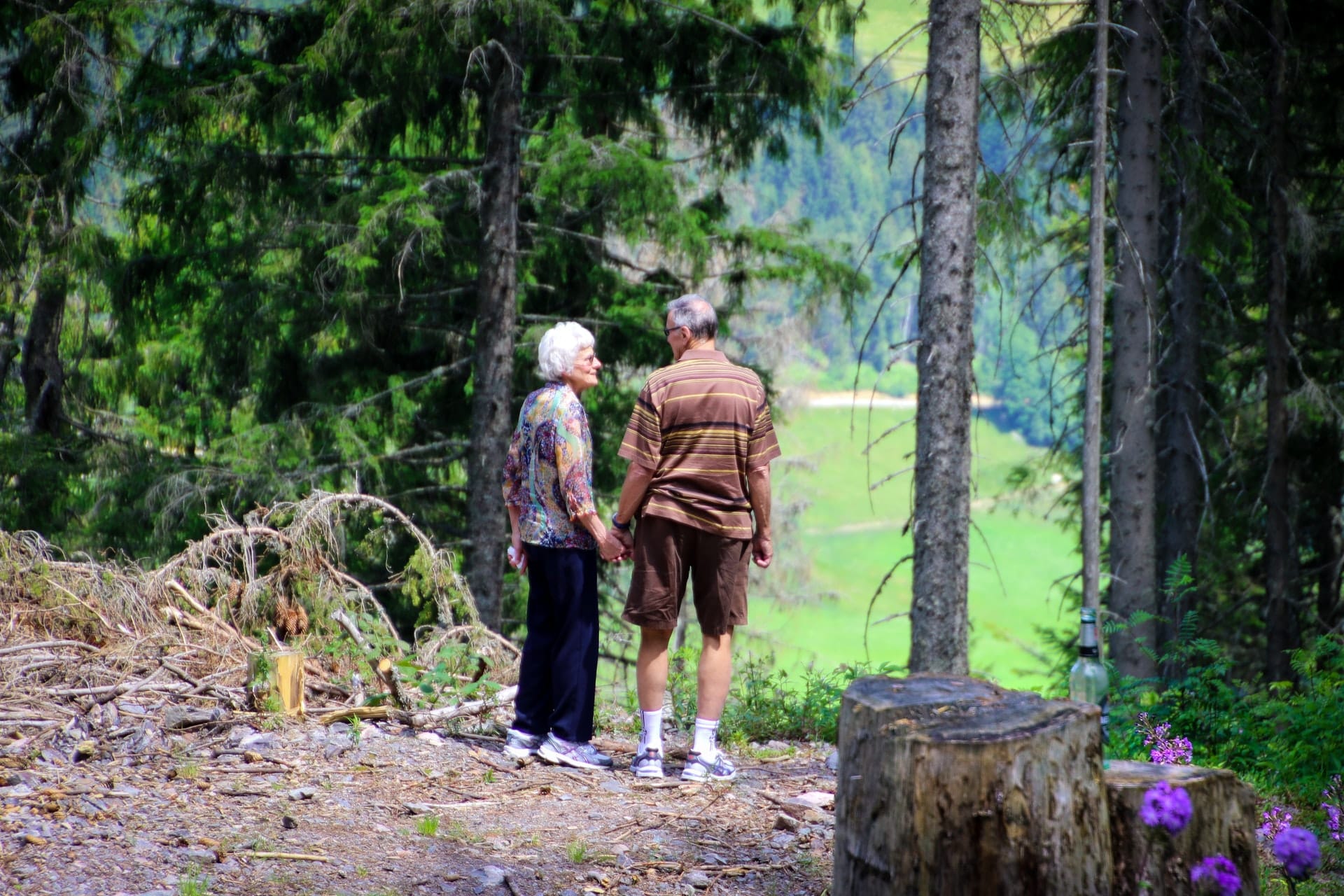 two-people-standing-in-forest-1307391